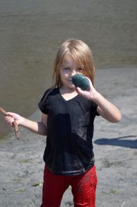Amelia found a pretty green rock on the beach.  