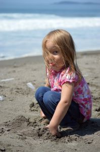 Annabelle being goofy on the beach.